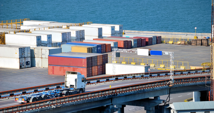 Port warehouse with cargoes and containers